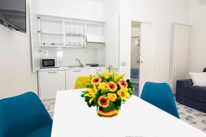 A kitchen or kitchenette at Ambra Sorrento Suites Short Rent