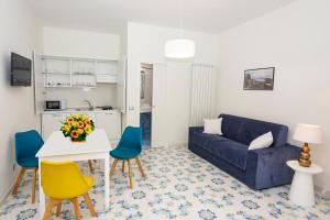 A television and/or entertainment centre at Ambra Sorrento Suites Short Rent