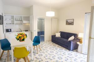 A kitchen or kitchenette at Ambra Sorrento Suites Short Rent