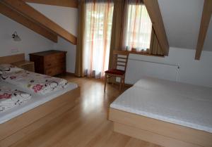 Postel nebo postele na pokoji v ubytování Residence Andrea