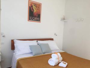 A bed or beds in a room at YooRoom