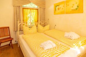 Postel nebo postele na pokoji v ubytování Apartments Wald-Residenz Bansin