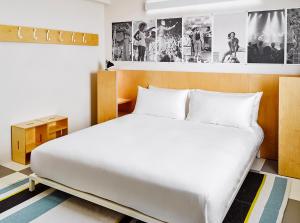 Ένα ή περισσότερα κρεβάτια σε δωμάτιο στο The Asbury Hotel