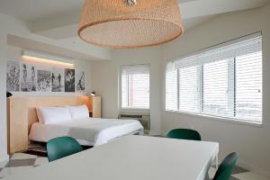Ένα ή περισσότερα κρεβάτια σε δωμάτιο στο The Asbury Hotel