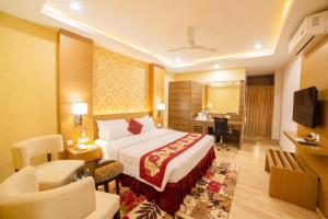 Voodi või voodid majutusasutuse Hotel Harrison Palace toas