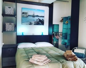 Ліжко або ліжка в номері Loft Vista Mare Elba