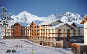 グダウリにあるGUDASKI Apartments, New Gudauri LOFT2 & LOFT1の雪山を背景にした建物
