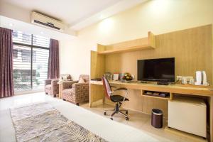 A television and/or entertainment center at Ascott The Residence Dhaka