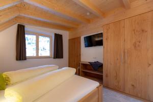 TV a/nebo společenská místnost v ubytování Alpen Apart Heiss - DELUXE XL Apartments
