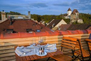 Un balcón o terraza de Boutique Hotel - Restaurant Orchidee