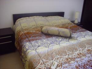 Ένα ή περισσότερα κρεβάτια σε δωμάτιο στο Apartament Villa Del Mare