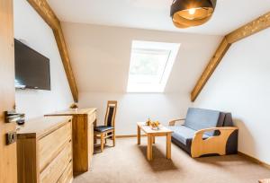 TV a/nebo společenská místnost v ubytování Hotel Palatín + 37 fotografií
