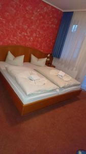 Postel nebo postele na pokoji v ubytování Hotel Kuhfelder Hof