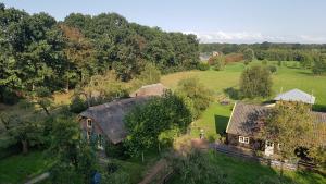 an aerial view of a house in a field at Casaprisco in Putten