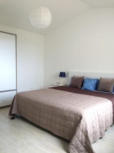 A bed or beds in a room at Casa Hermosa