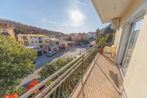 an apartment balcony with a view of a street at Apartments Sole Mar in Sutomore