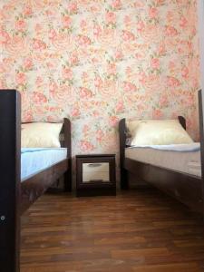 Postel nebo postele na pokoji v ubytování Panorama-hostel