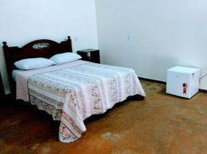 En eller flere senger på et rom på Praia do Jatobá
