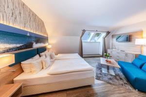 Ένα ή περισσότερα κρεβάτια σε δωμάτιο στο Hotel Blinkfüer