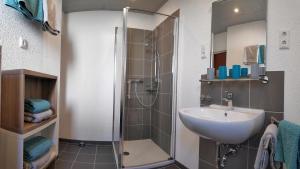 Ένα μπάνιο στο Ferienwohnung Grimm