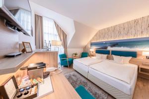 Ένα ή περισσότερα κρεβάτια σε δωμάτιο στο Hotel Blinkfüer