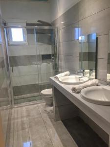 Ένα μπάνιο στο The Central Suites +30 φωτογραφίες