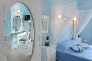Кровать или кровати в номере Agnadi Suites