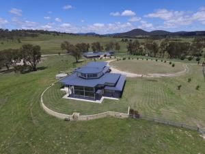 an overhead view of a house in a field at Donegal Farmstay in Sandy Flat