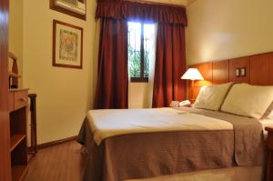 Postel nebo postele na pokoji v ubytování Las Ventanas Hotel Boutique