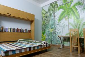 Danang Retreat House tesisinde bir odada yatak veya yataklar