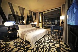 Ліжко або ліжка в номері Best Louis Hamilton Hotel Gwangan