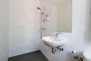 Koupelna v ubytování Vansari Hotel