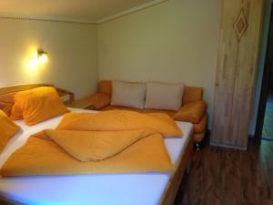 Postel nebo postele na pokoji v ubytování Appartements am See