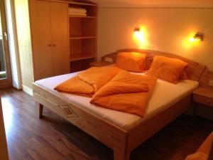 Postel nebo postele na pokoji v ubytování Appartements am See