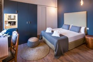 A bed or beds in a room at Lluna Aqua Soller - Adults Recommended