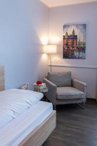 Postel nebo postele na pokoji v ubytování Hotel Westerfeld