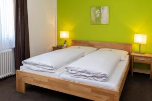 Postel nebo postele na pokoji v ubytování Hotel Westerfeld