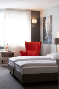 Postel nebo postele na pokoji v ubytování Hotel Westerfeld