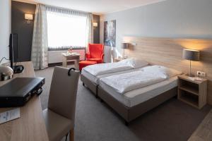 TV a/nebo společenská místnost v ubytování Hotel Westerfeld