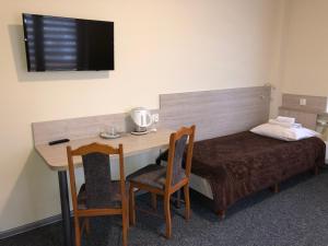 Posteľ alebo postele v izbe v ubytovaní SanatoriumnadKryniczanką