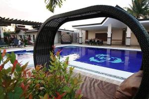 Bazén v ubytování A&A Garden Suites nebo v jeho okolí
