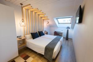 Katil atau katil-katil dalam bilik di Hotel Fruela