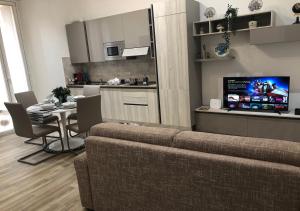 A kitchen or kitchenette at Central Lepetit apartment De Luxe