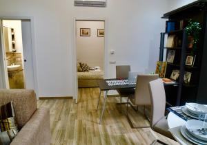 A seating area at Central Lepetit apartment De Luxe