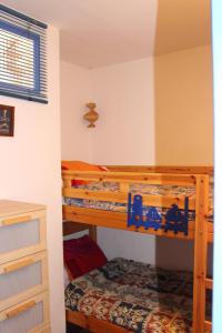 Letto o letti in una camera di Gites de France Bleu à la mer