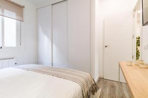 Кровать или кровати в номере Salamanca Luxury IX