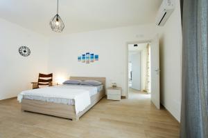 Postel nebo postele na pokoji v ubytování CASA 801