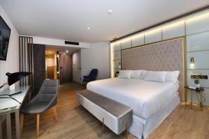 Voodi või voodid majutusasutuse Barceló Ourense toas