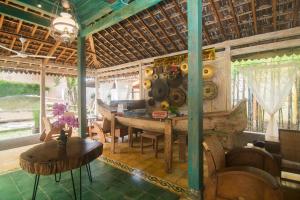 Posezení v ubytování Kampung Lawasan Heritage Cottage