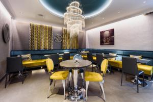 A seating area at RQ Boutique & Unique Hotel